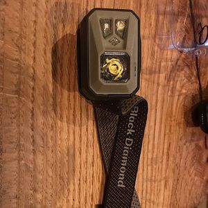 Black Diamond ReVolt headlamp. Good shape, works well. USB rechargeable.